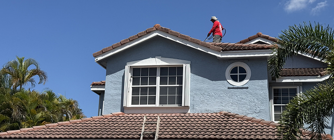 Painter working on a home